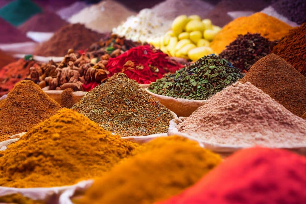 Piles of spices on display in Morocco, at a Medina souk, Marrakech, Incredible, vibrant colours